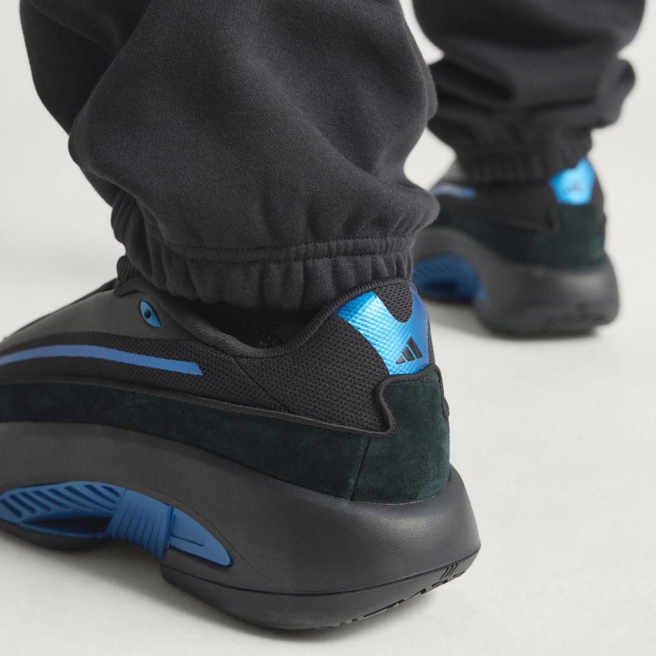 Hlače od flisa adidas Basketball (rodno neutralne)