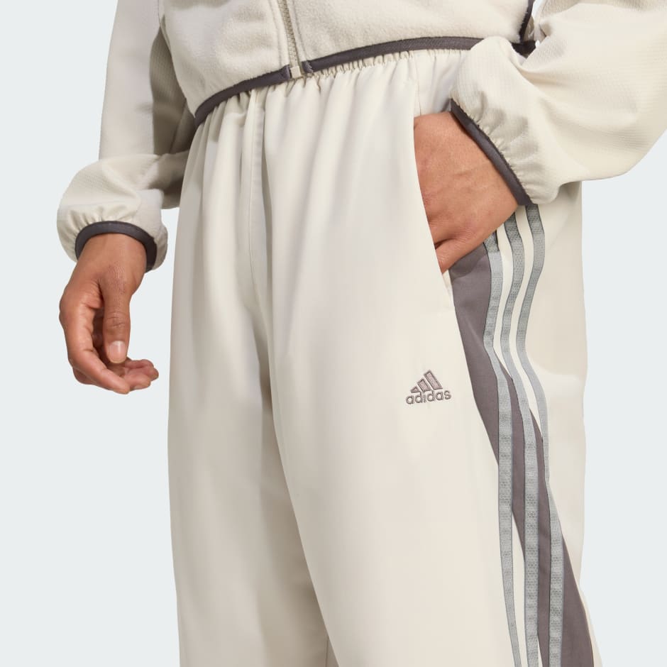 LOOSE CUTLINE TRACK PANTS