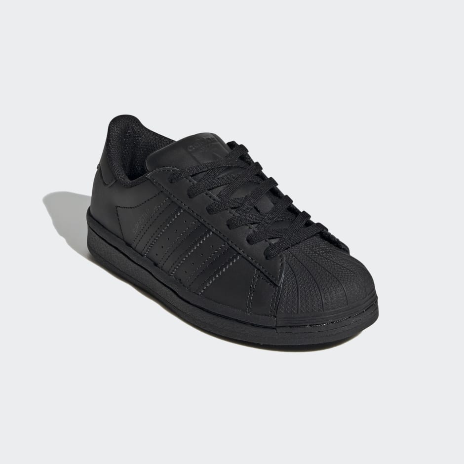 Adidas clasicos best sale blancos con negro