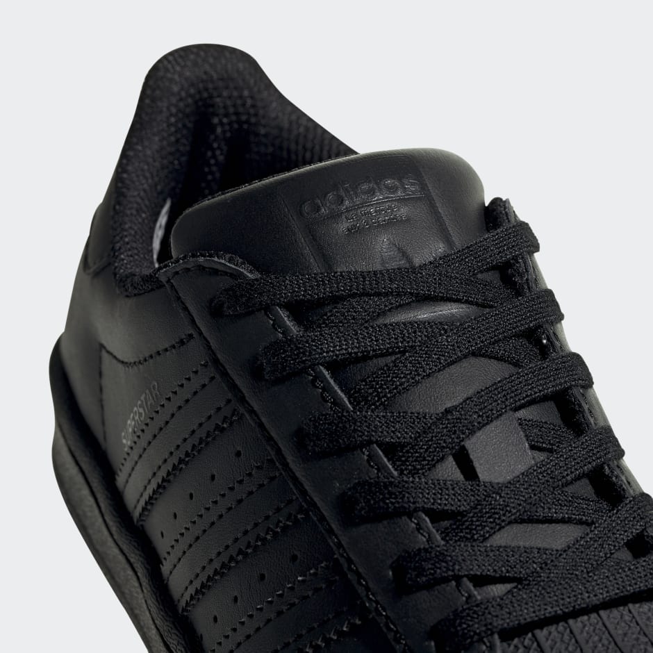 Adidas superstar black and silver hotsell