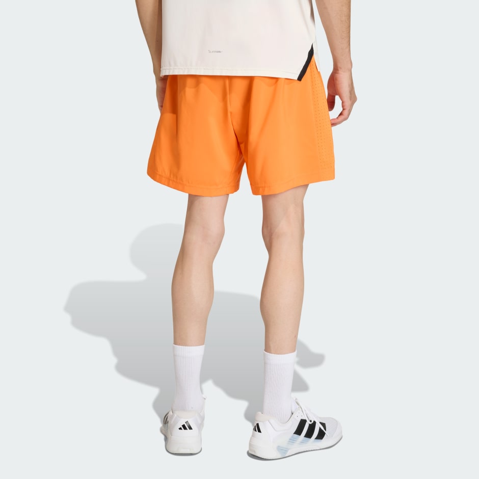 WORKOUT ESSENTIALS BASE WOVEN SHORT