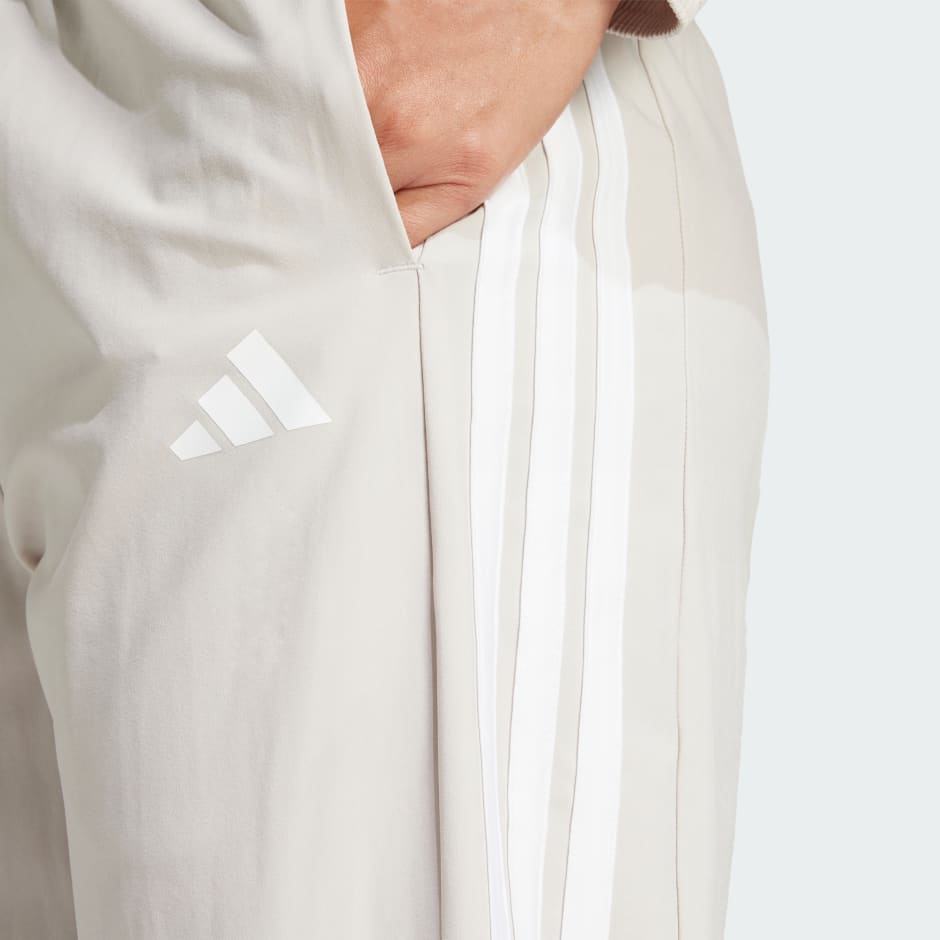 Train Essentials 3-Stripes Woven Pants