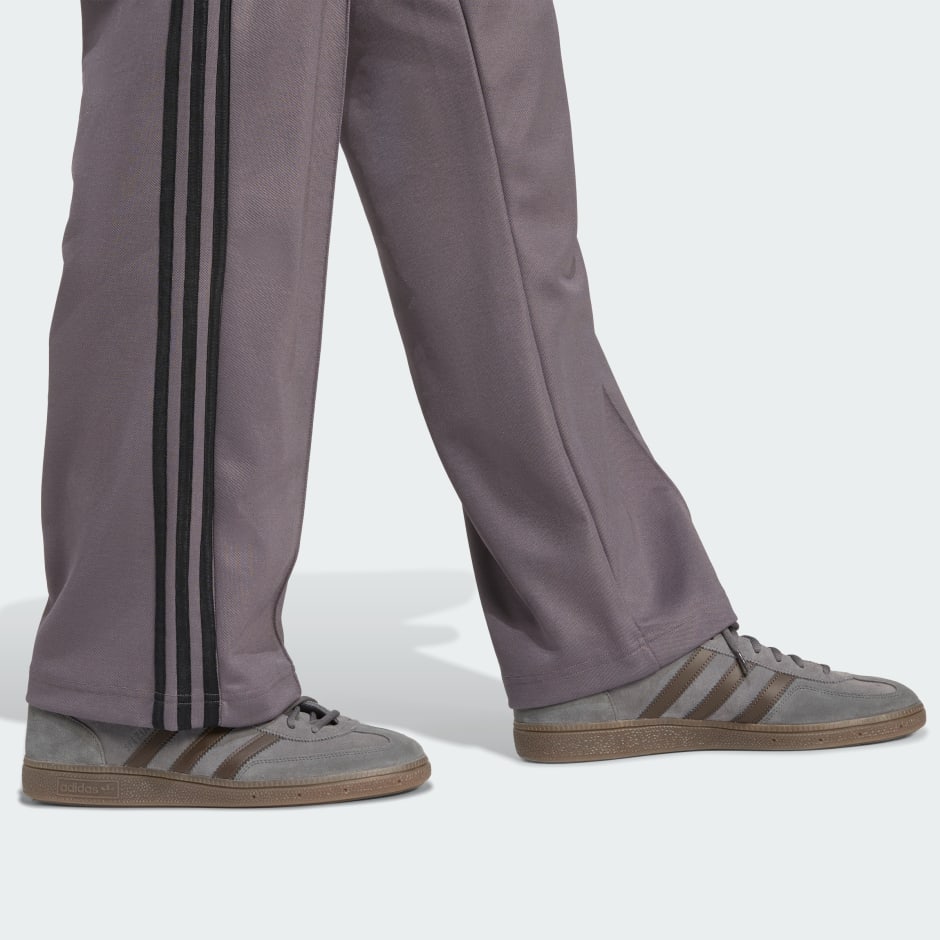 Pantaloni de trening cu croială largă Adicolor Firebird