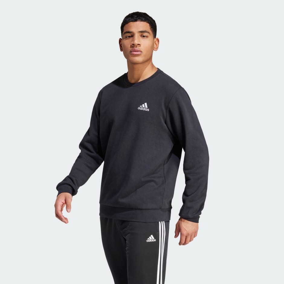 adidas FEELCOZY ESSENTIALS FLEECE SWEATSHIRT - Black | adidas UAE