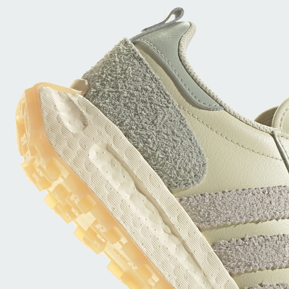 アイデンティティー SHOES - Retropy E5 Shoes - Yellow | adidas Oman
