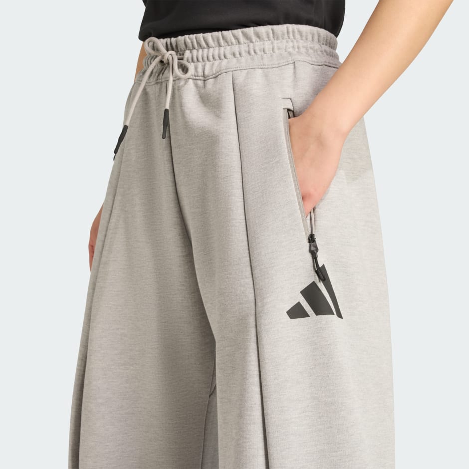 Hlače otvorenih poruba adidas Z.N.E.