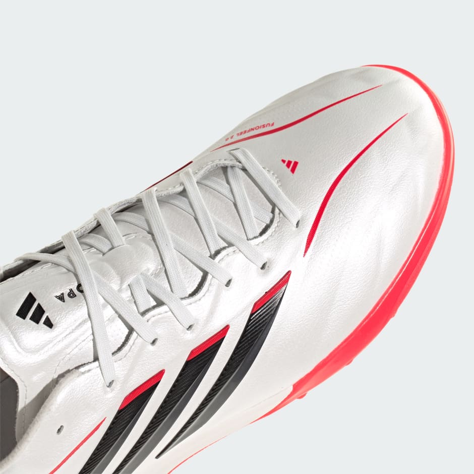 Ghete de fotbal COPA PURE IV PRO pentru gazon artificial