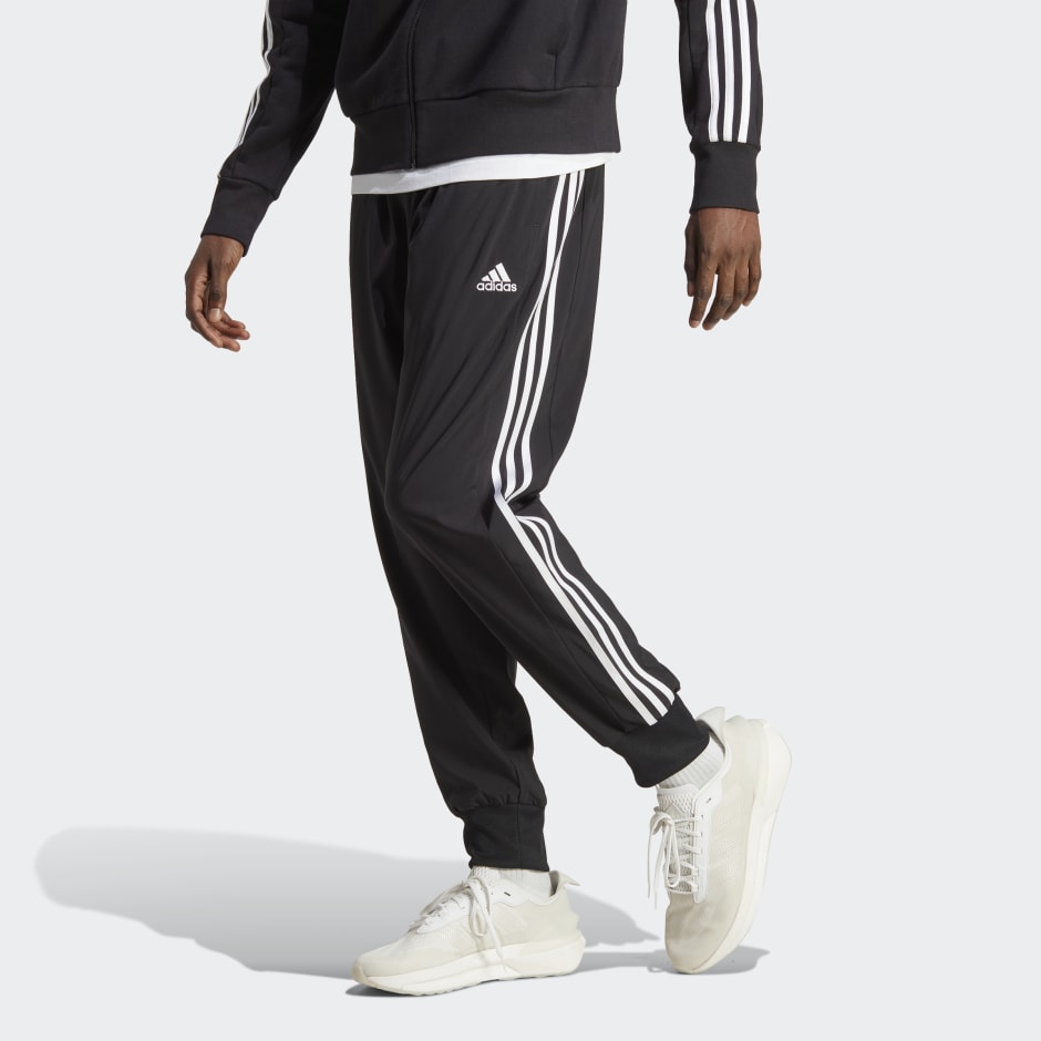 adidas Essentials Tapered Woven 3-Stripes Pants - Black | KW