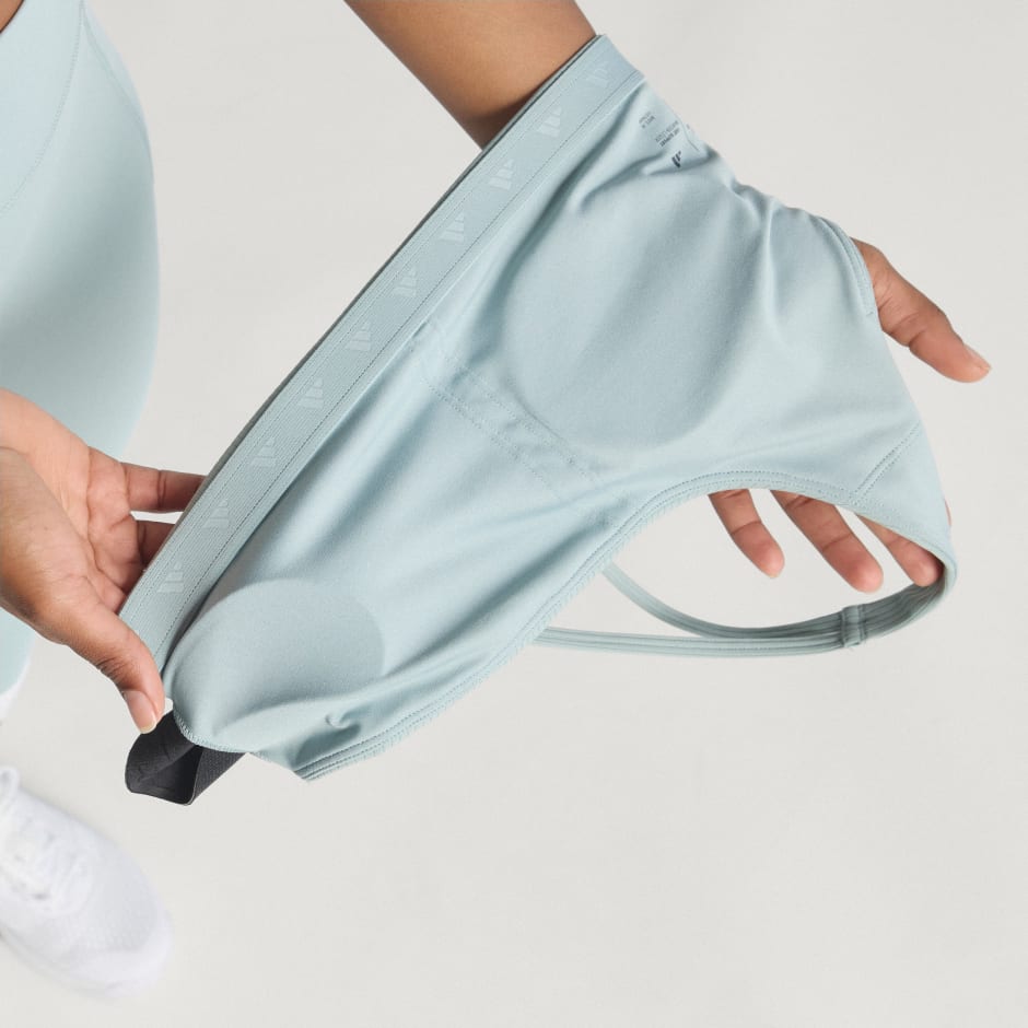 Sutien de antrenament Optime su striații, un umăr gol și susținere ușoară