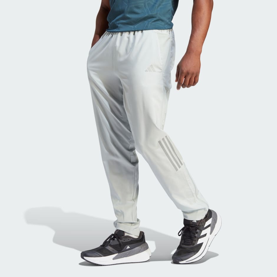 Men's Clothing - Own the Run Woven Astro Pants - Grey | adidas Saudi Arabia