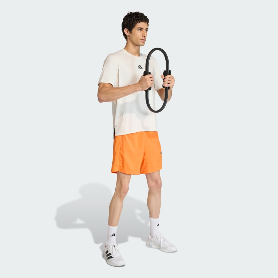 WORKOUT ESSENTIALS BASE WOVEN SHORT