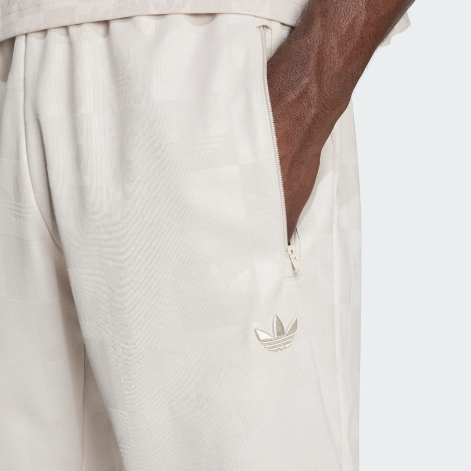 بنطال جري عادي مُوحّد اللون بطبعة كاملة