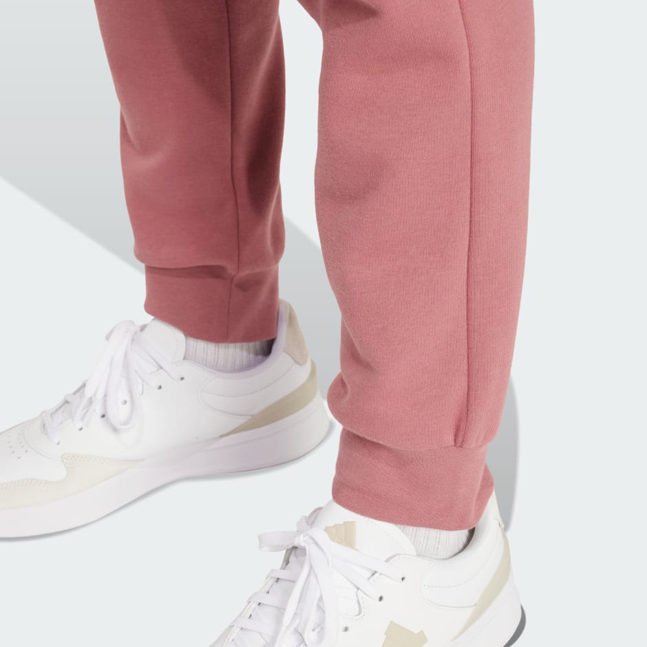 Pantaloni conici Essentials din polar