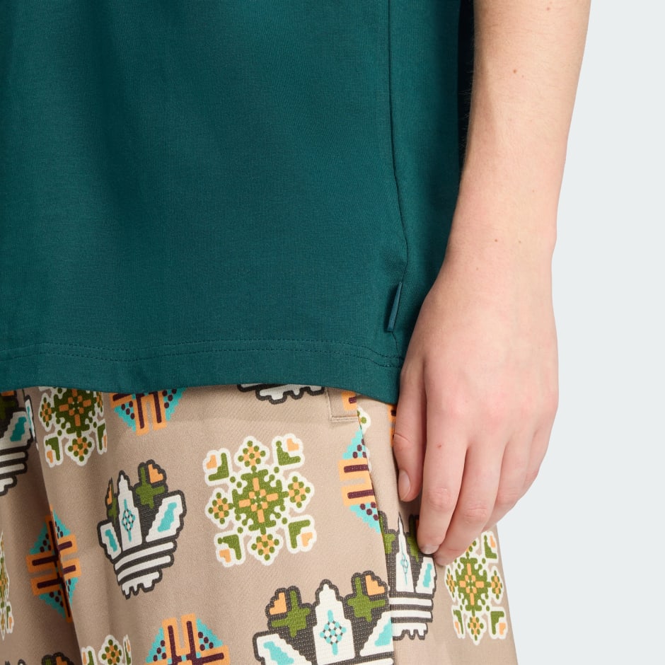 تيشيرت فضفاض مُوحّد اللون