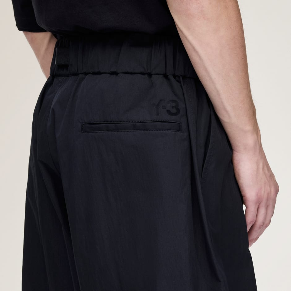 PANTALONI SCURȚI CU PICIOARE LATE Y-3 UT