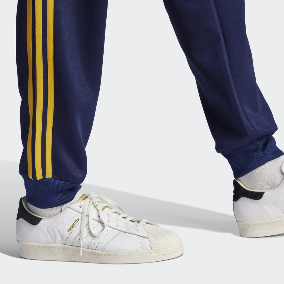 Ud Døds kæbe Hørehæmmet adidas Adicolor Classics+ SST Track Pants - Blue | adidas KE