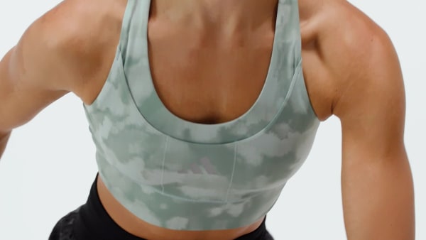 สีเขียว บราซัพพอร์ตระดับปานกลางแบบมีกระเป๋าสำหรับสวมวิ่ง adi365