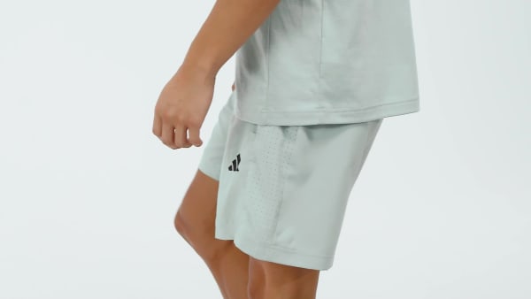 Groen WORKOUT ESSENTIALS BASE WOVEN SHORT