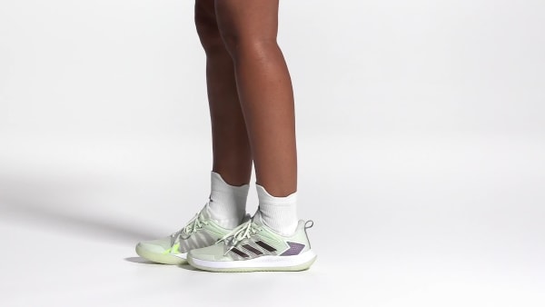 Women's green adidas tennis shoes top