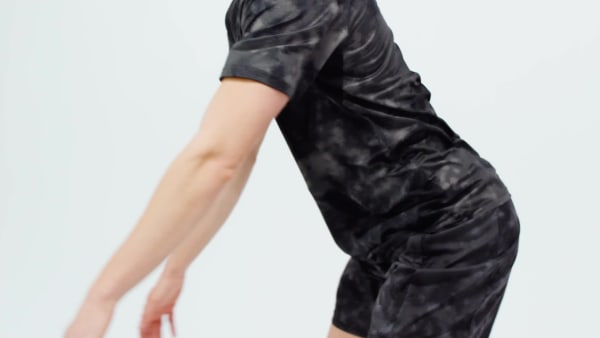 Negro polo Train Essentials Seasonal con estampado integral