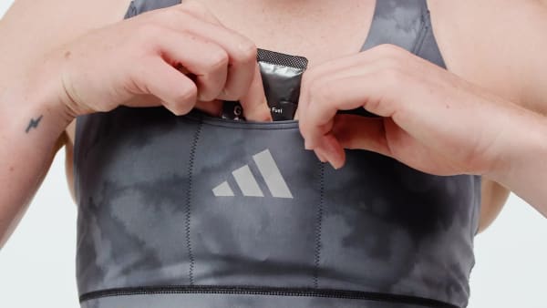 สีดำ บราซัพพอร์ตระดับปานกลางแบบมีกระเป๋าสำหรับสวมวิ่ง adi365